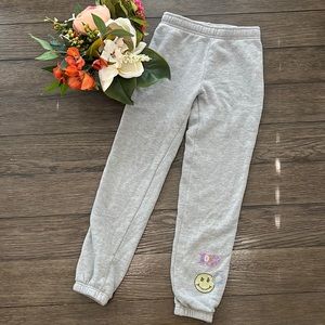 Girls Super Soft by Butter sweat pants with emoji design